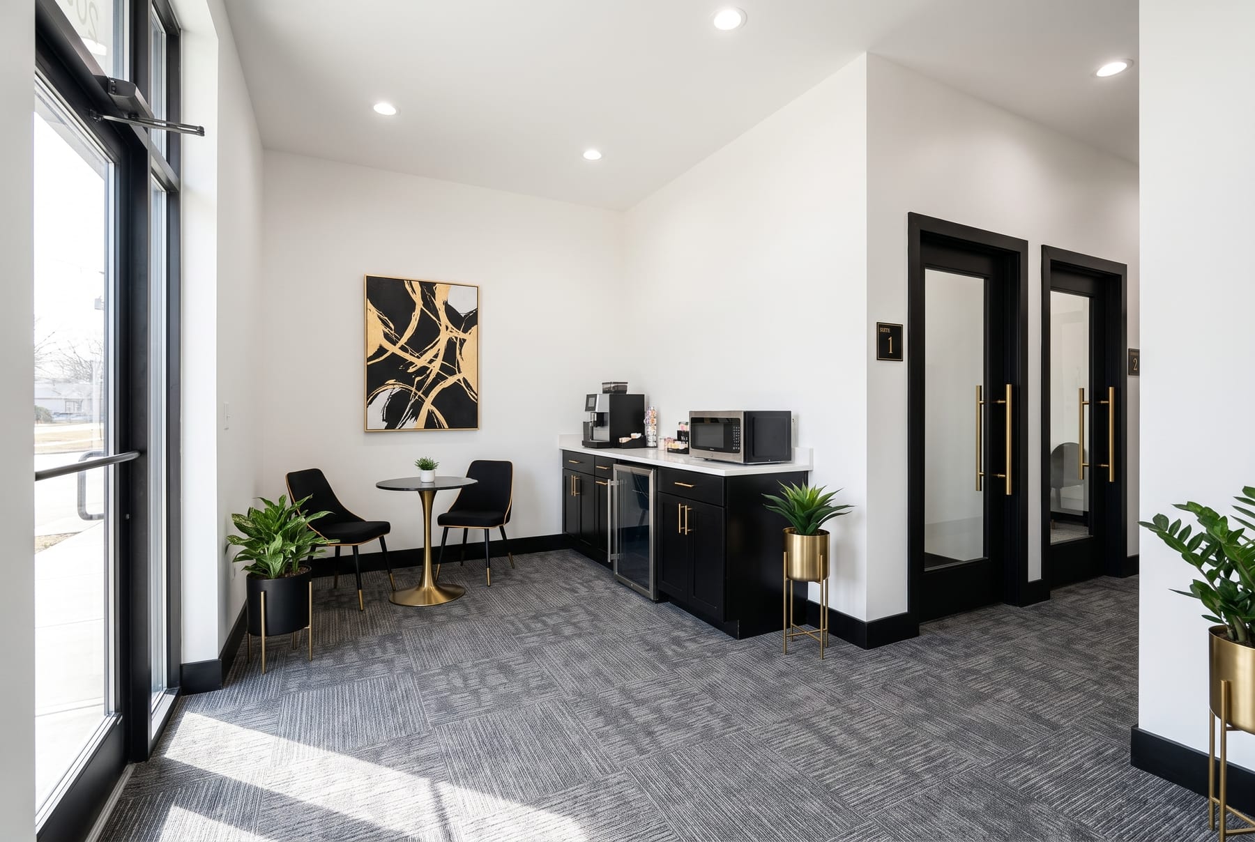 Rendering of the lobby and break area with a coffee counter and cafe table